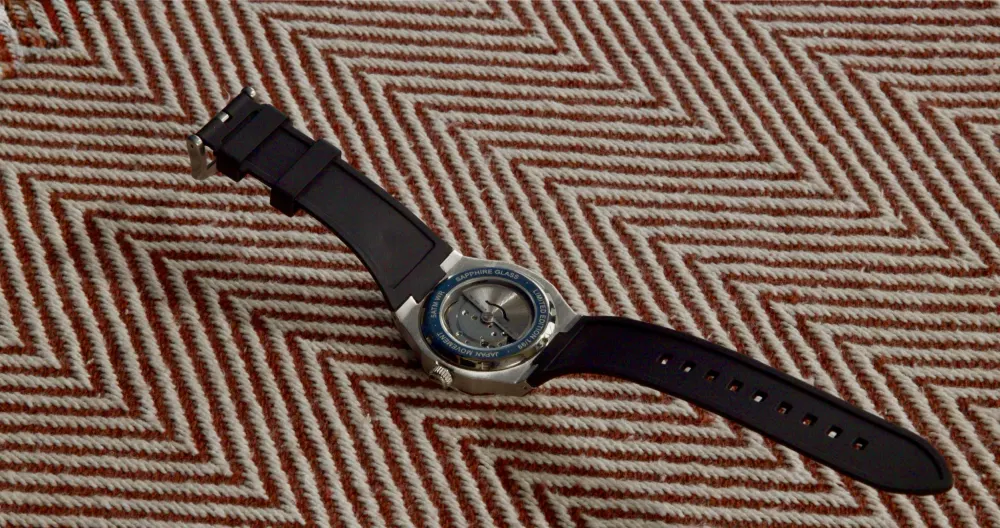 The Visto on a red and white herringbone weave.