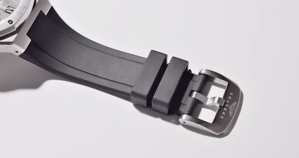 The strap and engraved pin buckle.